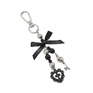 Fashionable Bowknot Heart Crucifix Pendant Keychain for Religious Enthusiasts