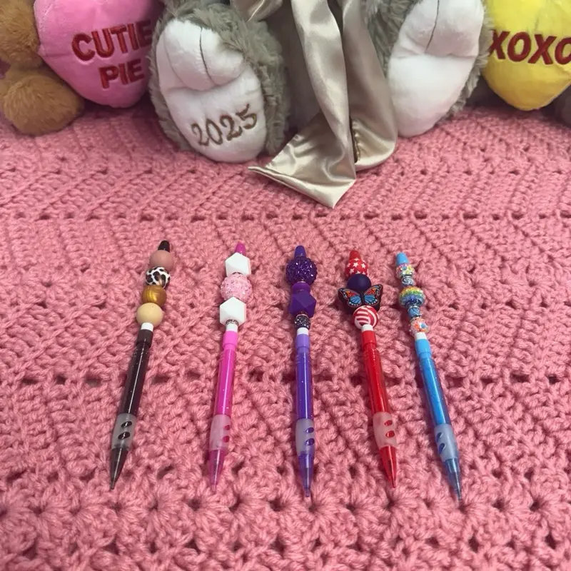 Beaded mechanical pencil