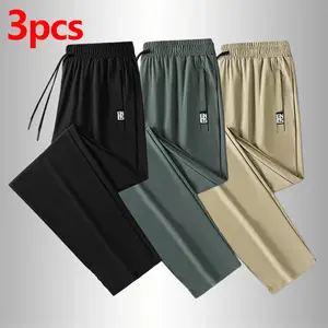 Men’s lightweight, breathable summer pants — made from ice silk fabric, featuring a loose fit, straight cut, adjustable drawstring waist, stretchable quick-dry design; suitable for running, hiking, and outdoor activities.