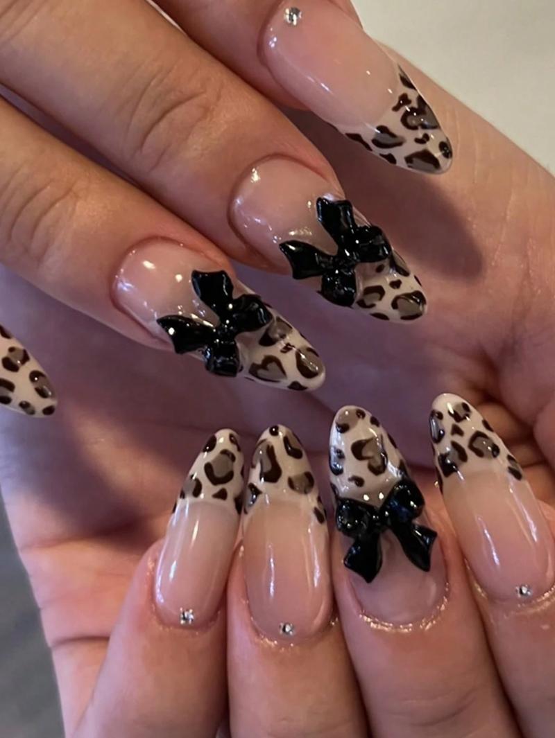 24-Piece Medium Almond Press-On Nails with Leopard Print French Tip & 3D Black Bow - Glossy Nude Pink Base, Full-Cover Artificial Nails for Daily Wear​