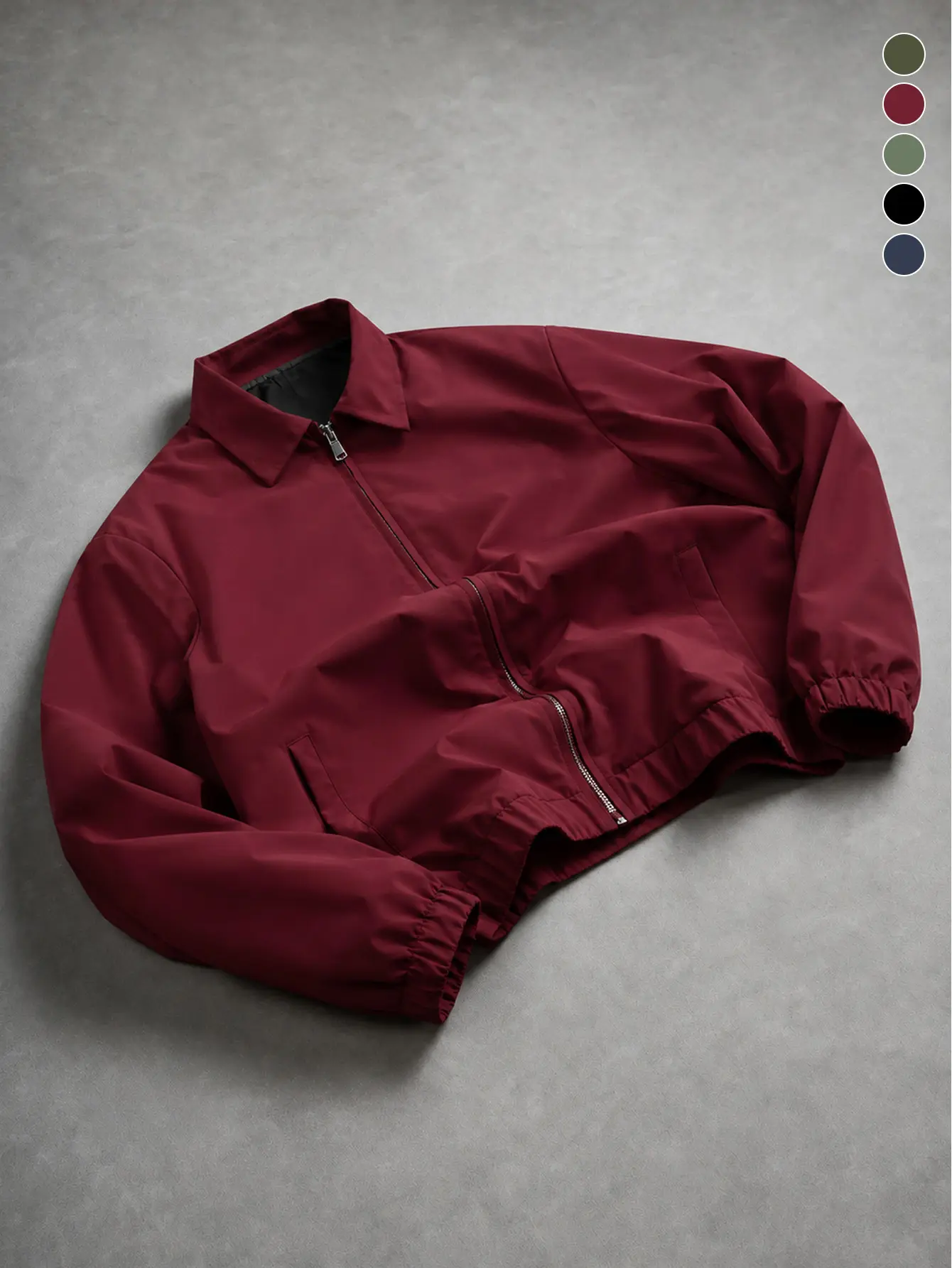 Men’s wine red jacket with a notched lapel and zipper closure, windproof design; elastic ribbed cuffs at the hem; wrinkle-resistant, waterproof woven fabric; zip front plus hidden side pockets; suitable for everyday wear, commuting, and city walks.