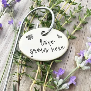'Love Grows Here' Plant Marker