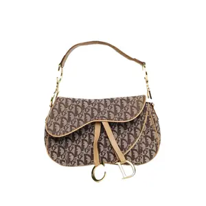 Pre-owned Dior leather Tote Bags Brown canvas, gold buttons, 2002 vintage, double saddle, armlet handbag