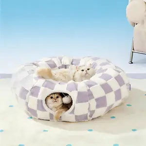 Warm & Cozy Donut Bed – A comfortable, fluffy play-and-rest bed designed for cats and small dogs. This soft, plush round pet bed is perfect for adding winter warmth. Machine washable with a non-slip bottom.