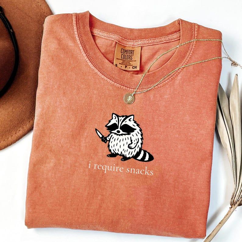I Require Snacks Raccoon Tee – Funny Comfort Colors Shirt, Goblincore Animal Lover Gift, Cozy Snack Gremlin Tee