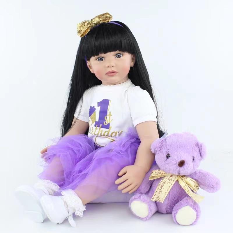 22" Realistic Newborn Baby Girl Doll with Long Black Hair Soft Vinyl Body Lifelike Features Expressive Details Includes Baby Bottle Birth Certificate Perfect Christmas Gift for Kids Ages 3-6