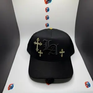 Black cap with embroidered crosses