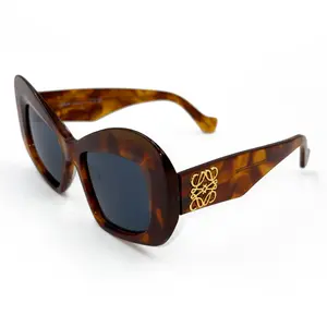 Loewe Core Sunglasses Tortoiseshell Oversized Frame with Gold Anagram Hardware & Dark Lenses for Everyday Wear