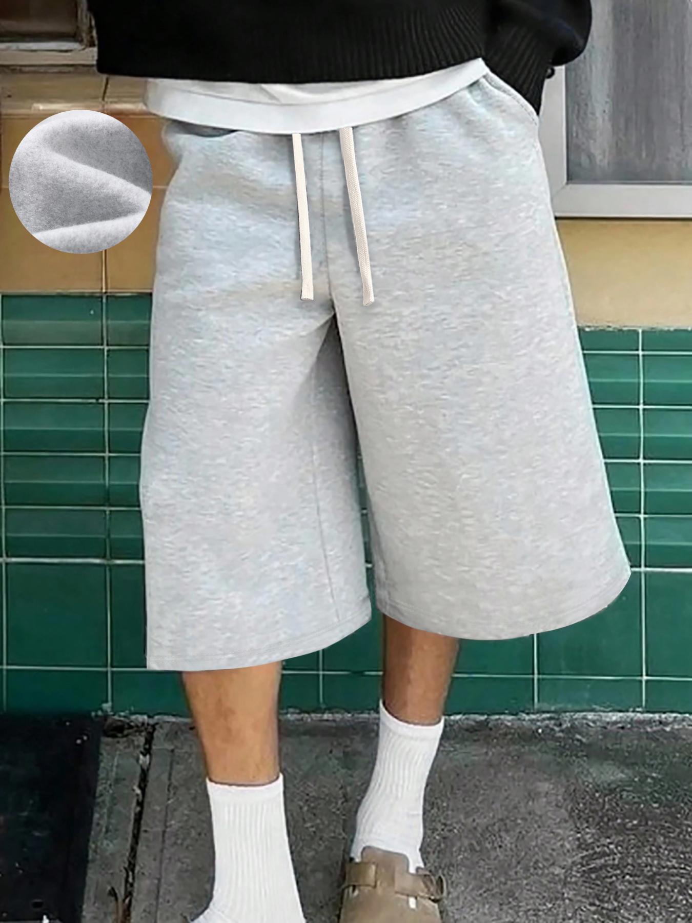 Menâs casual wide-leg shorts with an elastic drawstring waistband, solid color for all seasons, sporty fit, soft and comfortable for everyday wear, street-style shorts SpringStatements Beige