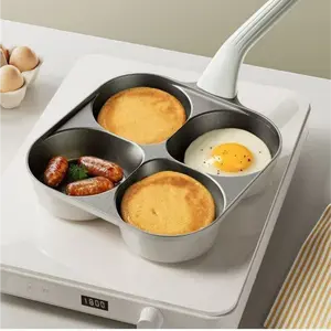 4-hole non-stick egg frying pan, pancake pan, suitable for gas stoves and induction cookers. It heats up quickly and evenly, made of durable non-stick titanium-aluminum alloy material, easy to clean, and one pan can make Nonstick Cooking Tools pan