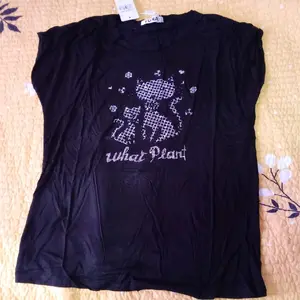 T-shirts with bedazzled designs on them