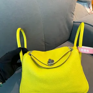 Pre-owned HERMÈS Lindy 26 in Lime (yellow) w/ palladium hardware